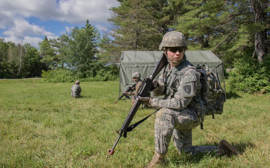 Spc. Randon Kelly, a military intelligence analyst with the 120th Regional Support Group, conducts security during a training exercise in executing warrior tasks and battle drills at Plymouth Training Site in Plymouth, Maine. The 120th Regional Support Group, one of two brigade-level units in Maine, will conduct base support operations for American allies in Europe as part of the U.S. European Command’s Operation Atlantic Resolve.