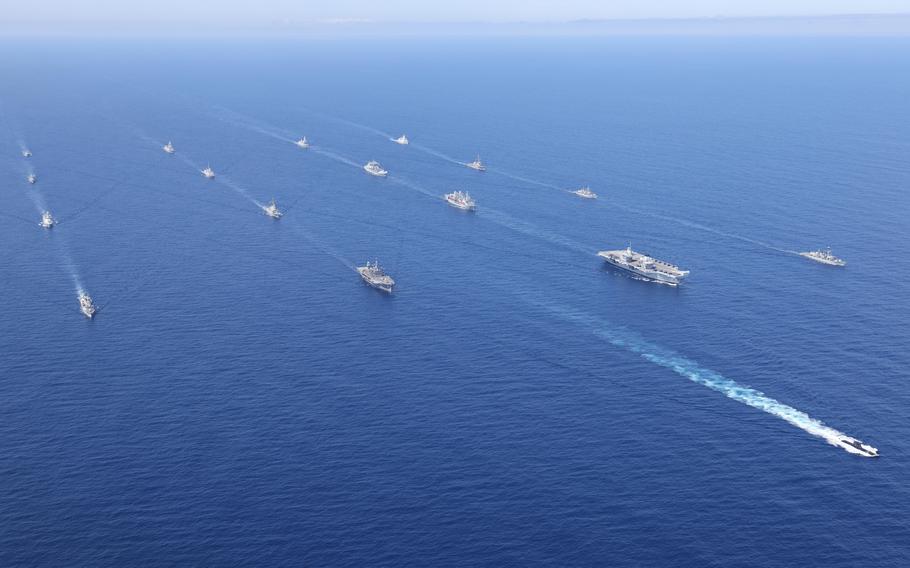 HMS Queen Elizabeth and USS The Sullivans join ships of NATO's Standing Maritime Groups 1 and 2 on May 28, 2021, in the Atlantic Ocean. The rendezvous was part of Steadfast Defender 21, an exercise designed to test NATO’s ability to rapidly deploy forces to the coast of Portugal and the Black Sea region.