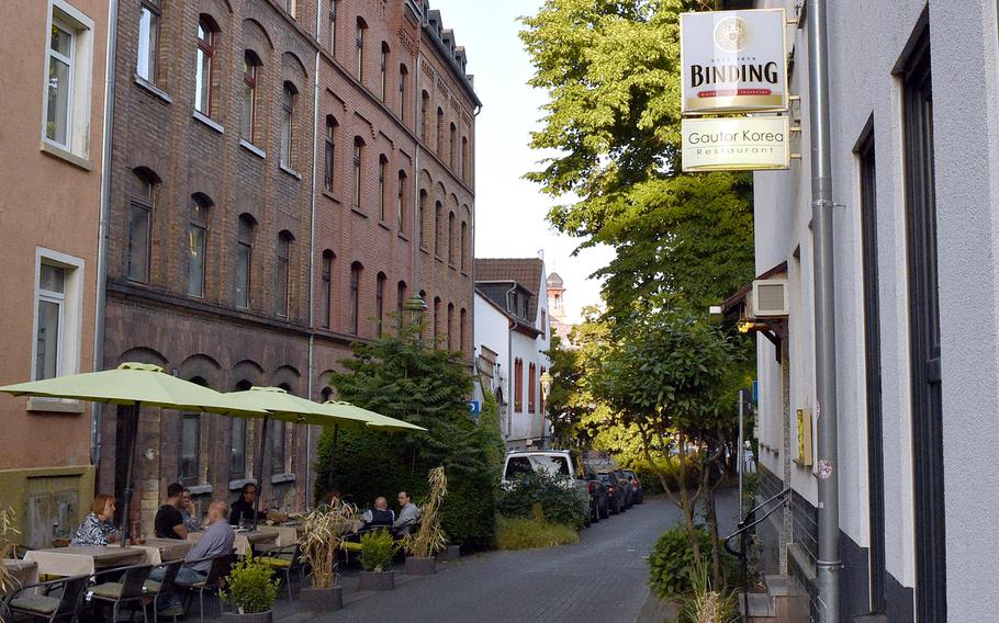 Restaurant Gautor Korea in Mainz, Germany, seen here on June 2, 2023, offers indoor and outdoor seating. The latter is across the street from the restaurant's entrance.