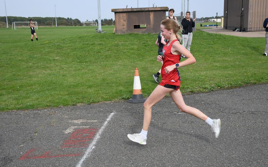 Lakenheath Lancer Kiarra Taylor crosses the finish line Saturday. Taylor finished the 5-kilometer race in first place with a time of 26 minutes, 42 seconds.