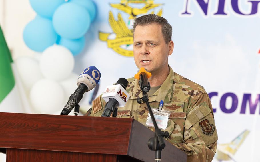 U.S. Air Force Brig. Gen. Joel Safranek, head of the U.S. Air Force Security Assistance and Cooperation Directorate, gives remarks April 27, 2023, at Kainji Air Base in Nigeria. The base recently received 12 A-29 Super Tucano planes and completed supporting construction projects as part of a $500 million U.S. foreign military sale to Nigeria.