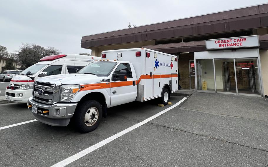 Japanese and American ambulances park out the 374th Medical Group's urgent care entrance at Yokota Air Base in western Tokyo, March 17, 2023.