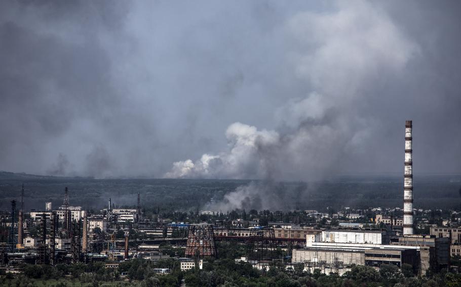 Smoke rises above the nearby city of Severodonetsk during a battle between Russian and Ukrainian troops in the eastern Ukraine region of Donbas on June 20, 2022.
