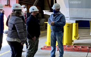 Then-Chief of Naval Operations Adm. Mike Gilday tours Fincantieri Marinettte Marine Shipyard with leadership from the shipyard on March 23, 2021, in Marinette, Wis. 