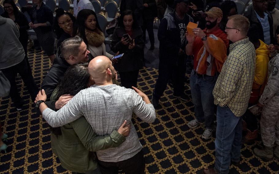 Actor Victor Almanzar poses with audience members after a performance of “Jesus Hopped The ‘A’ Train” at Yokota Air Base, Japan, March 20, 2017.