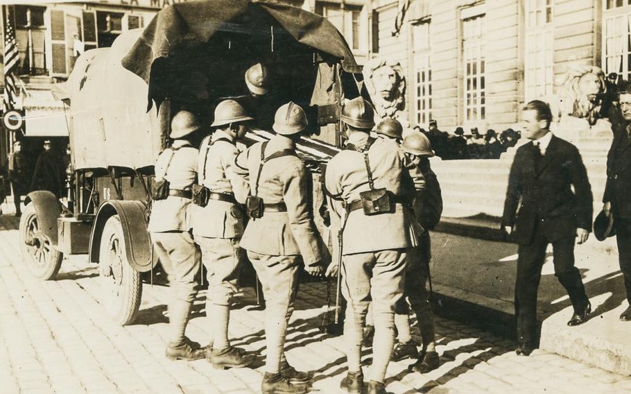 French soldiers unload a casket containing a candidate for the U.S. Tomb of the Unknown Soldier at city hall in Chalons-sur-Marne, France, in October 1921. On Sunday, hundreds gathered at the same site in what is now Chalons-en-Champagne for the 100th anniversary of the selection.