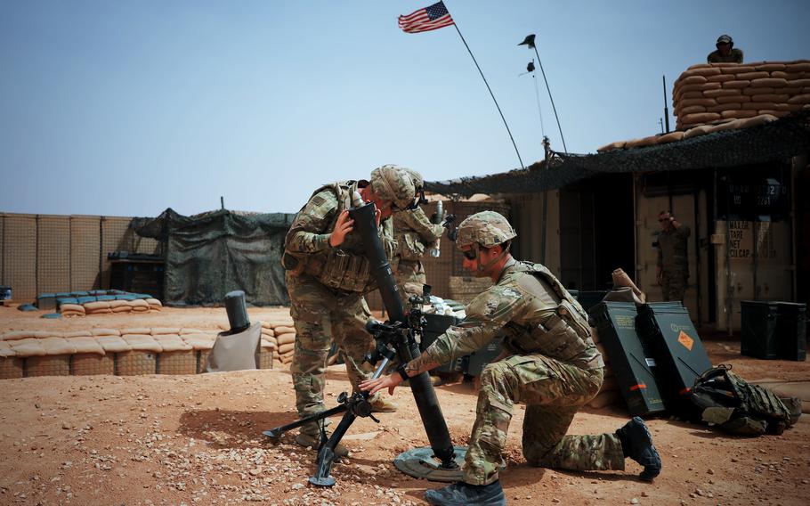 Soldiers deployed to At-Tanf Garrison, Syria, fire an 81 mm mortar weapon system during a readiness exercise on April 22, 2020. U.S. forces shot down another one-way attack drone Sunday, Nov. 5, 2023, that was targeting American and coalition troops near a base in neighboring Syria, a U.S. official told the Associated Press.