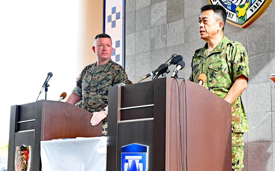 The head of the Japan Ground Self-Defense Force’s Western Army, Lt. Gen. Toshikazu Yamane, speaks to reporters alongside the III Marine Expeditionary Force’s commander, Lt. Gen. James Bierman Jr., at Camp Ishigaki in Okinawa prefecture, Oct. 24, 2023. 