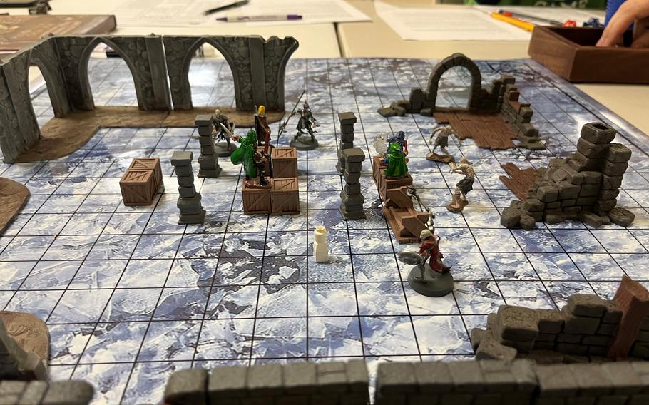 Adventurers wade through flooded subterranean chambers as they battle undead enemies in a recent Lord of the Rings Roleplaying game in Washington, D.C.