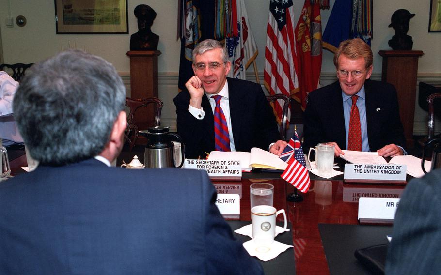 United Kingdom’s former Ambassador to the U.S. Christopher Meyer (right) met with former Secretary of State for Foreign and Commonwealth Affairs Jack Straw and former Deputy Secretary of Defense Paul Wolfowitz for a discussion on Oct. 24, 2001 at the Pentagon. Meyer, who as ambassador to the United States served as go-between for Prime Minister Tony Blair and the George W. Bush administration after the 9/11 attacks and the run-up to the Iraq War in 2003, died July 27 at age 78.