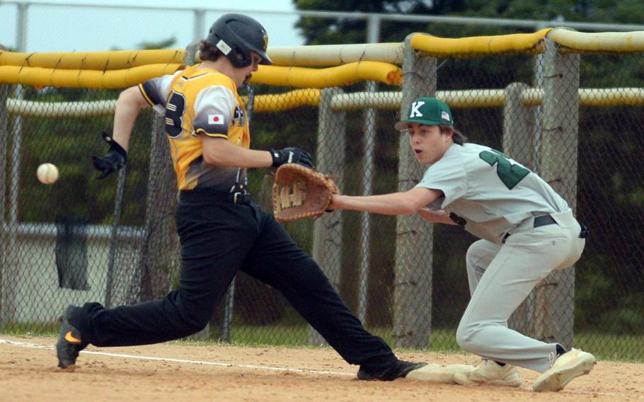 Kadena's Josiah Stuits gets back to first base ahead of a pickoff throw to Kubasaki first baseman Jacy Fisk during Monday's DODEA-Okinawa season-opening baseball game. The Panthers rallied to win 10-8.