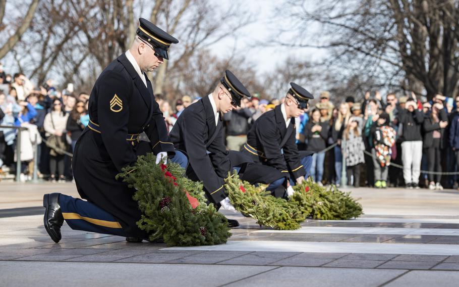Tomb guards from the 3d Infantry Regiment (The Old Guard) place wreaths at the gravesites of the Unknown Soldiers at the Tomb of the Unknown at Arlington National Cemetery, Arlington, Va., Dec. 16, 2023. 