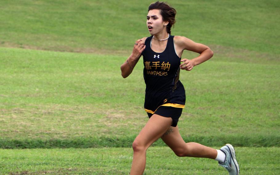 Kadena’s Karise Johnson heads for the finish in capturing her second consecutive Okinawa district cross country girls title.