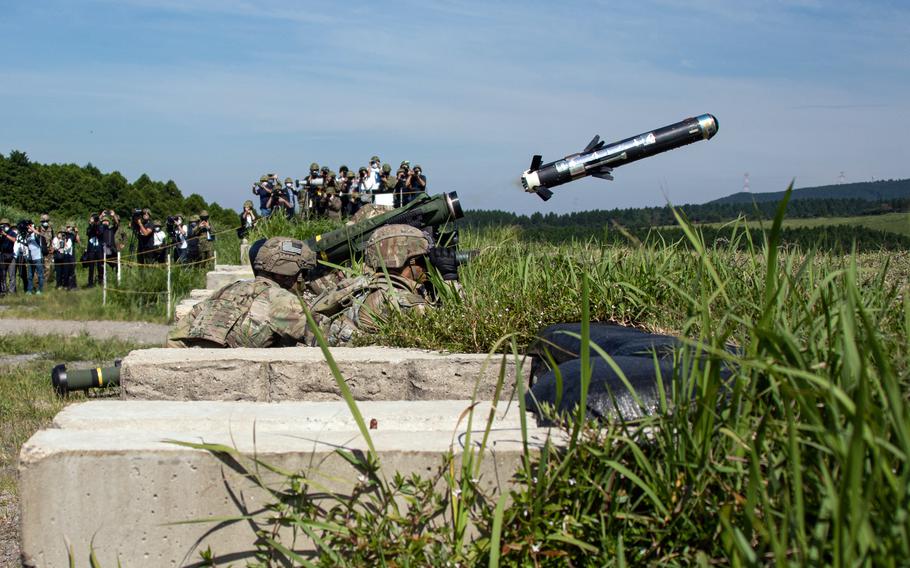 Soldiers from the 11th Airborne Division out of Fort Wainwright, Alaska, fire a Javelin anti-tank missile at Oyanhora Training Area in Kumamoto, Japan, Sunday, Aug. 28, 2022. 
