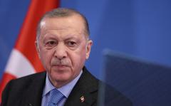 Turkey's President Recep Tayyip Erdogan addresses media representatives during a news conference at EU Headquarters in Brussels on March 24, 2022. 