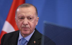 Turkey's President Recep Tayyip Erdogan addresses media representatives during a news conference at EU Headquarters in Brussels on March 24, 2022. 