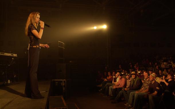 Hed: Songs of a Heartland Country Singer, 2003

Yongsan Garrison, Nov. 1, 2003: Country singer Chely Wright on stage at Yongsan Garrison. The singer, best known for her hit songs Single White Female and Shut Up and Drive,  performed a free show for troops.

META TAGS: USO; military life; R&R; entertainment; country music; singer; 