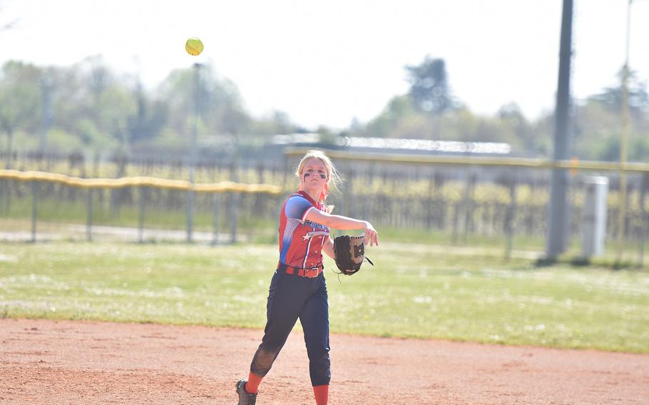 Caylee Gillispie throws to first.