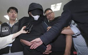 A man who opened an emergency exit door during a flight, arrives to attend an arrest warrant review at the Daegu District Court in Daegu, South Korea, Sunday, May 28, 2023.