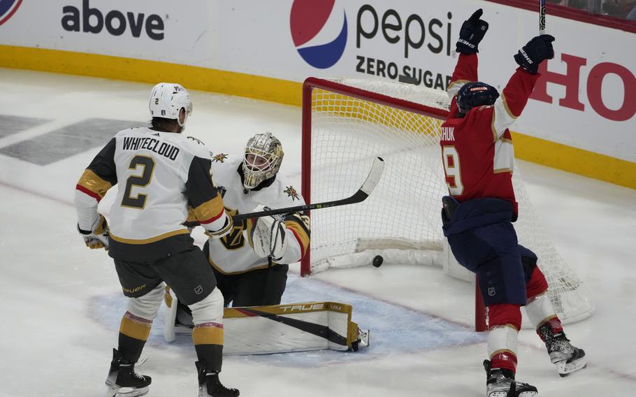 Florida Panthers left wing Matthew Tkachuk (19) celebrates the game-winning goal by teammate Carter Verhaeghe during overtime in Game 3 of the NHL Stanley Cup Finals, Thursday, June 8, 2023, in Sunrise, Fla. 
