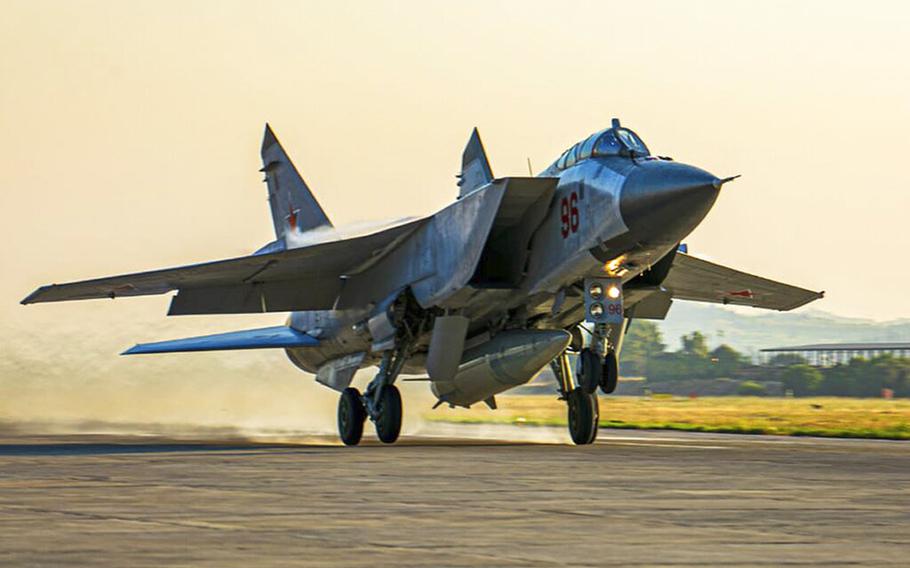 A Russian MiG-31 fighter jet carrying a Kinzhal missile takes off from the Hemeimeem air base in Syria on June 25, 2021. The Defense Ministry said three MiG-31 fighters with Kinzhal hypersonic missiles arrived Thursday, Aug. 18, 2022 at an air base in the Baltic Sea exclave. 