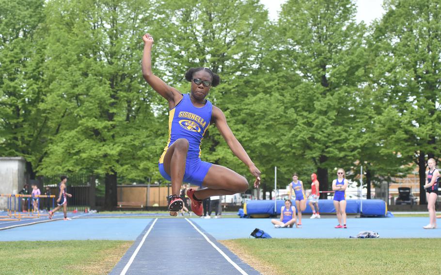 Sigonella's Rickalia Goss flies through the air on the way to winning the long jump Saturday, April 29, 2023, at a DODEA-Europe meet in Pordenone, Italy. Goss also won the 100, 200 and 400.
