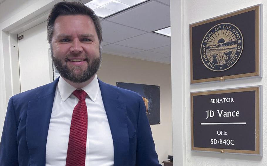 Newly elected U.S. Sen. J.D. Vance of Ohio shows visitors around his temporary office at the U.S. Capitol.