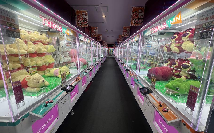 An aisle of UFO catchers at the Round1 in Musashimurayama, Japan, Jan. 8, 2023. 