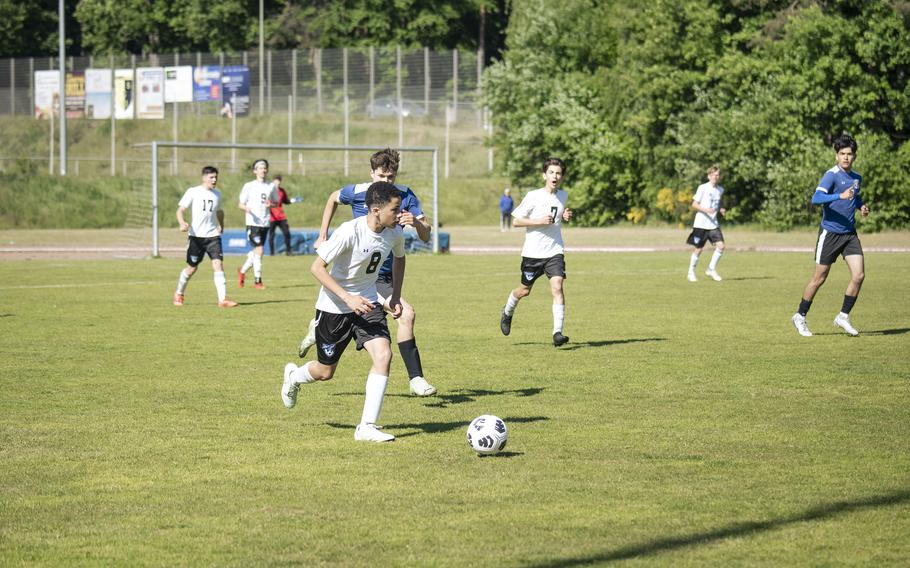 Jace Jobity, a freshman with the Hohenfels Tigers, dribbles the ball in a matchup against the Brussels Brigands in their first match of the 2025 DODEA European Division III soccer championships in Landstuhl, Germany on May 19, 2025. 