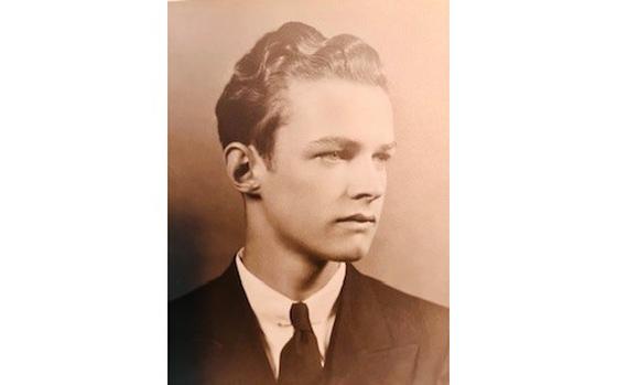A sepia-tinted portrait of a young man.