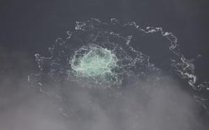 FILE - In this picture provided by Swedish Coast Guard, a leak from Nord Stream 2 is seen, on Sept. 28, 2022. (Swedish Coast Guard via AP, File)