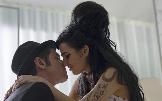 Jack O’Connell, left, plays Blake Fielder-Civil and Marisa Abela stars as Amy Winehouse in “Back to Black.” 