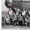 The crew of the WWII aircraft pose with the plane,