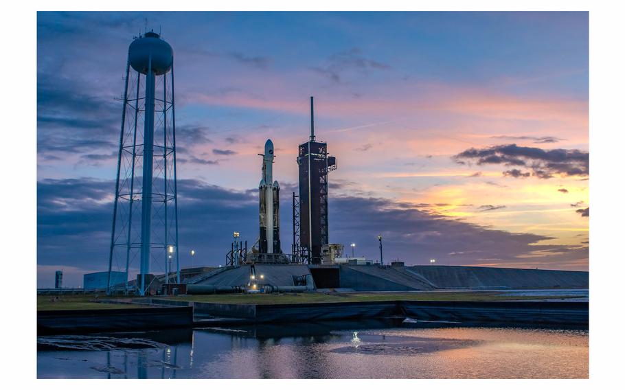 The SpaceX Falcon Heavy on Launch Pad 39-A at Kennedy Space Center awaiting launch for the USSF-52 mission.