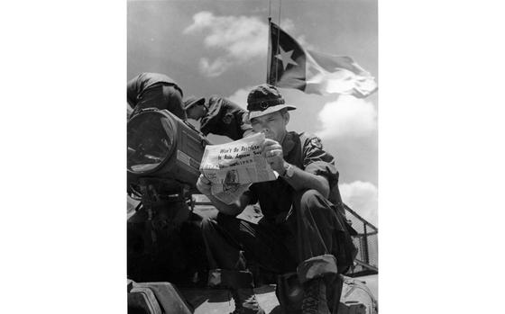 Cu Chi, Vietnam, Aug. 31, 1970: Spec. Cecil Bean of the 3rd Squadron; 4th Cavalry Regiment reads an August 31, 1970 Pacific Stars and Stripes, Vietnam edition. The Texas state flag can be seen flying upside down behind him. The 3d/4th normally flies the flag as a nod to their first campaign during the Indian Wars. The flying of a flag upside down is generally a signal of distress or danger, although it is not clear if it was flown this way by intent or error.

Looking for Stars and Stripes’ coverage of the Vietnam War? Subscribe to Stars and Stripes’ historic newspaper archive! We have digitized our 1948-1999 European and Pacific editions, as well as several of our WWII editions and made them available online through https://starsandstripes.newspaperarchive.com/

META TAGS: Pacific; South Vietnam; military life; Stars and Stripes history; reader; 3rd Squadron; 4th Cavalry Regiment; 25th Infantry Division