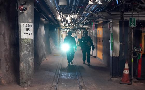 Secutiry and fire watch team members patrol the Red Hill Bulk Fuel Storage Facility in Halawa, Hawaii, Sep. 6, 2023.