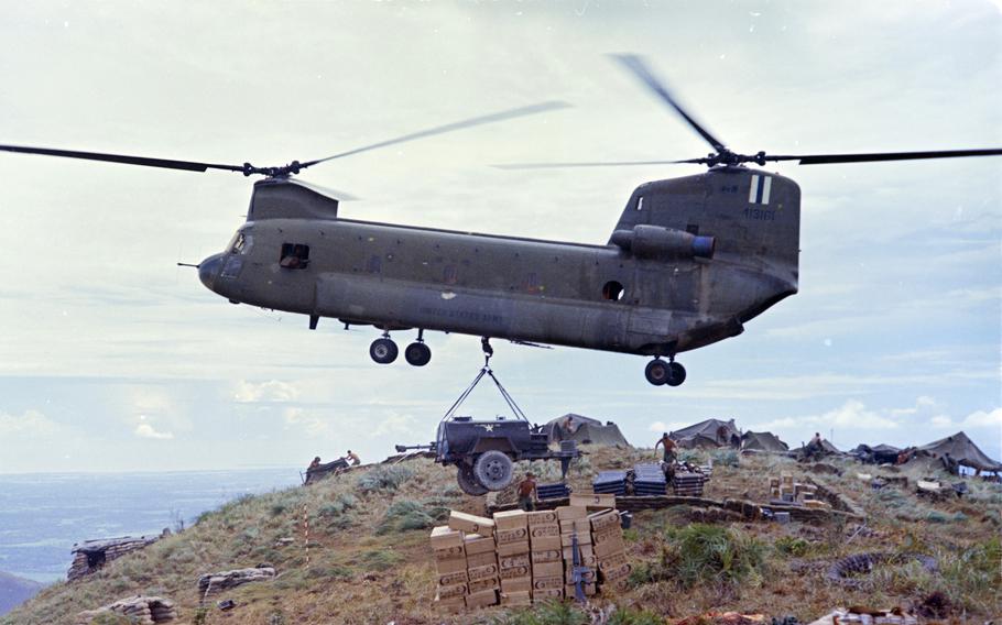A U.S. Army CH-47 Chinook lowers a water trailer to a hilltop camp in Tam Ky, Vietnam, on Sept. 15, 1967.