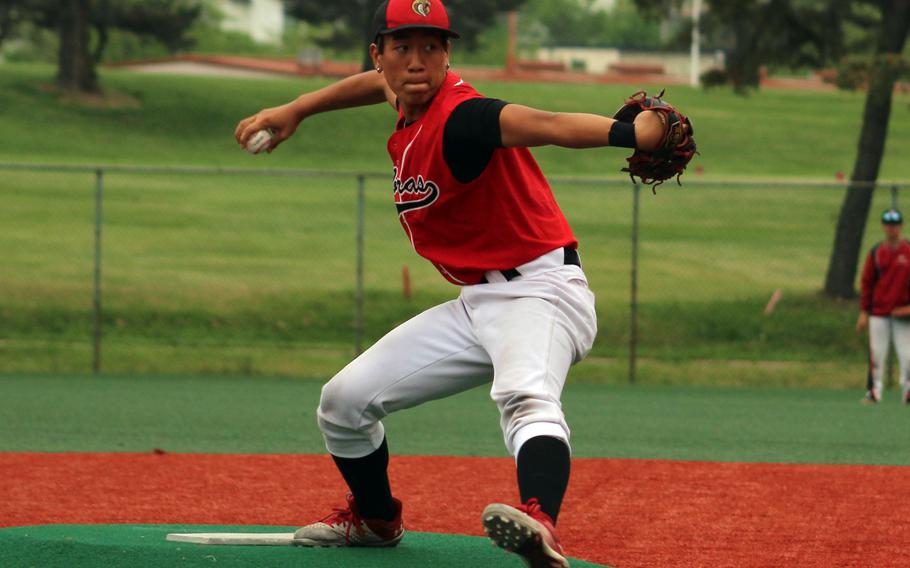 E.J. King right-hander Neo Purificacion delivers during Monday's Division II baseball tournament. The Cobras tied Zama 0-0 and beat Robert D. Edgren 8-1.