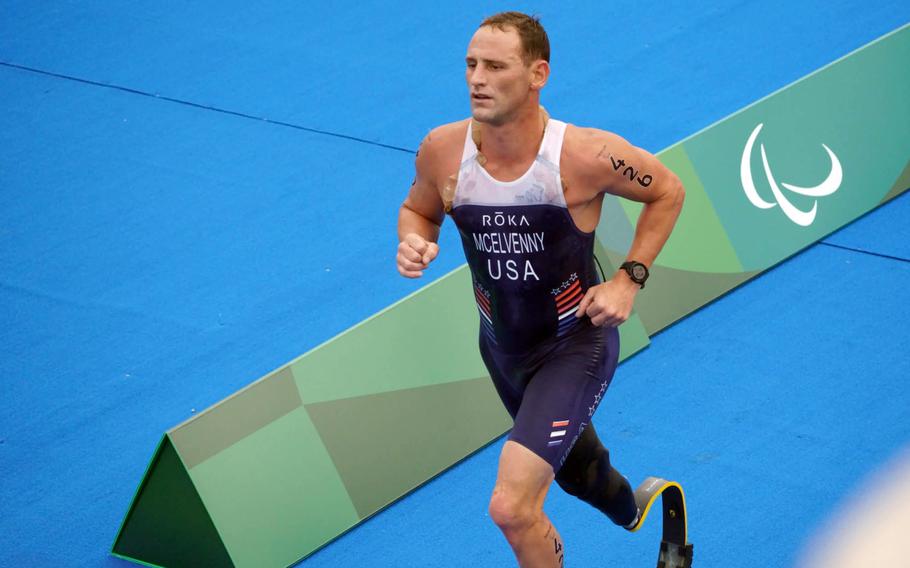 Former Marine captain Eric McElvenny competes in a Paralympic triathlon at Odaiba Marine Park in Tokyo, Saturday, Aug. 28, 2021. He lost his right leg to an improvised explosive device in 2011 while serving with 2nd Battalion, 4th Marine Regiment in Helmand Province, Afghanistan.