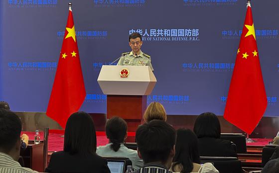 Chinese defense ministry spokesperson Senior Col. Wu Qian speaks during a monthly media briefing in Beijing, Thursday, Sept. 28, 2023. A Chinese Defense Ministry spokesperson said Thursday that he was "not aware of the situation" in the ministry's first public comments on the disappearance of the defense minister from public view about one month ago. (AP Photo/Emily Wang)