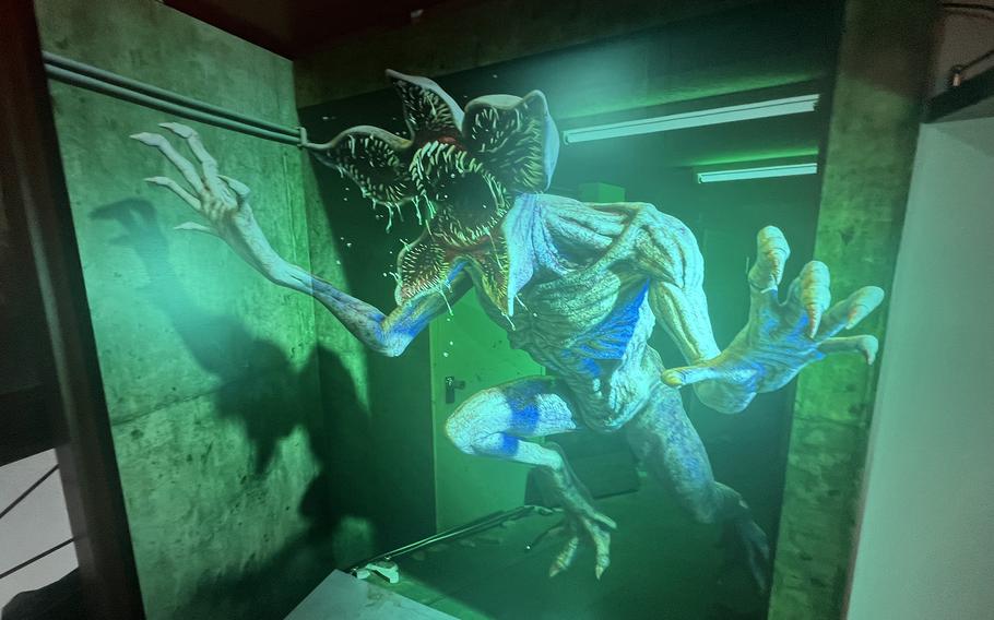 A 3D-looking Demogorgon makes an appearance at Stranger Pronto, a “Stranger Things”-themed cafe in Tokyo’s Shibuya district. 