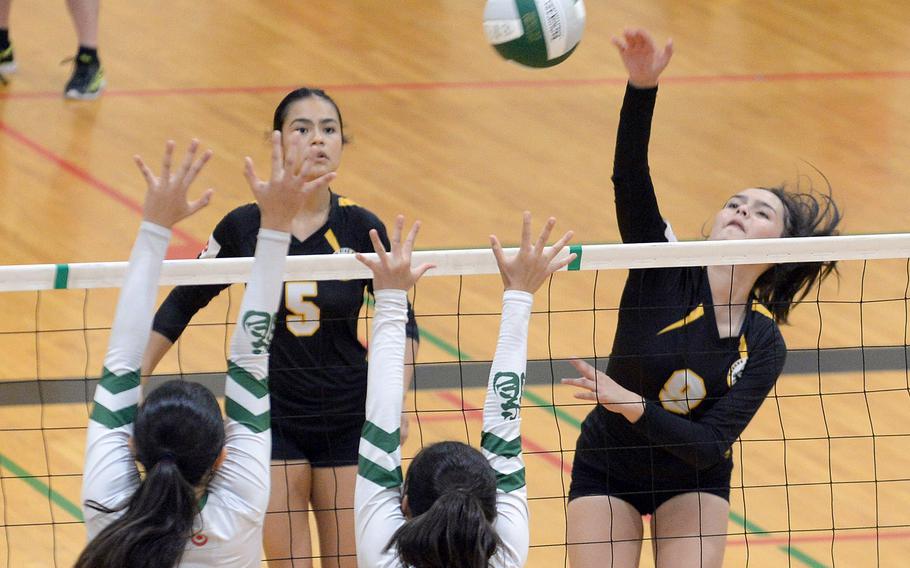 Sisters Haide Alvarez and Aylin Alvarez, right, transfers from Texas, combined for 22 kills in Kadena's five-set victory Tuesday over Kubasaki, the Panthers' first over the Dragons in 10 years.