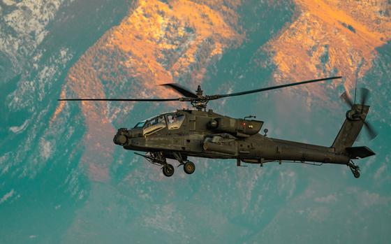 An AH-64 Apache helicopter takes off from West Jordan, Utah, during a training exercise in 2019. Two soldiers were injured Feb. 12, 2024, when their Apache crashed near the Army Aviation Support Facility in West Jordan.