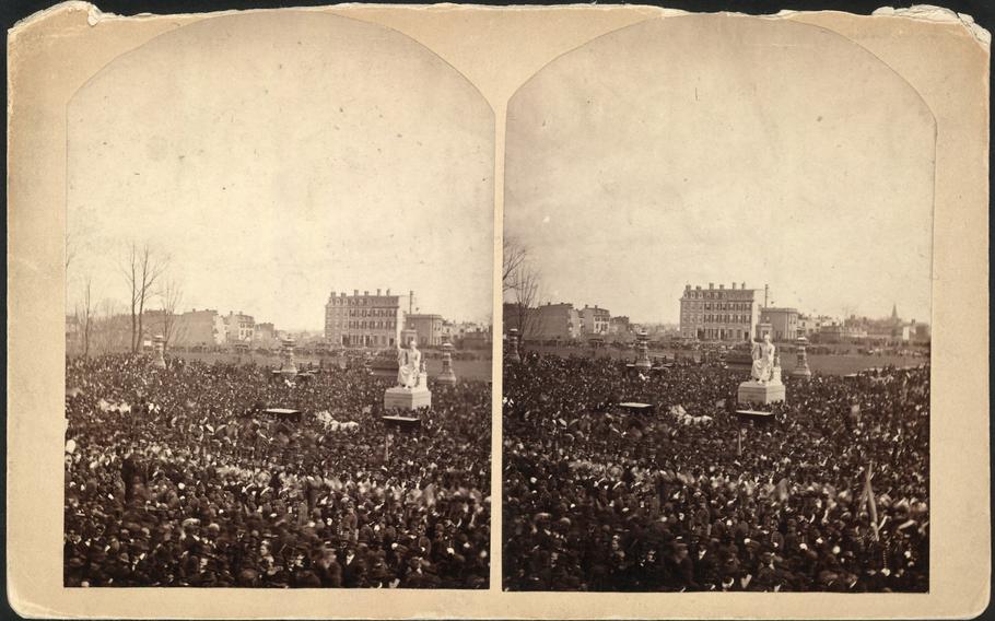 Stereo card view of the crowd at the inauguration of Rutherford B. Hayes, on the east front grounds of the U.S. Capitol, surrounding Horatio Greenough’s statue of George Washington, in 1877. 