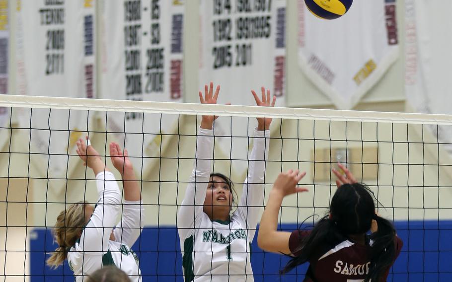 Matthew C. Perry's Raelin Reyes goes up for the ball at the net against Daegu's Jaellin Abaya.