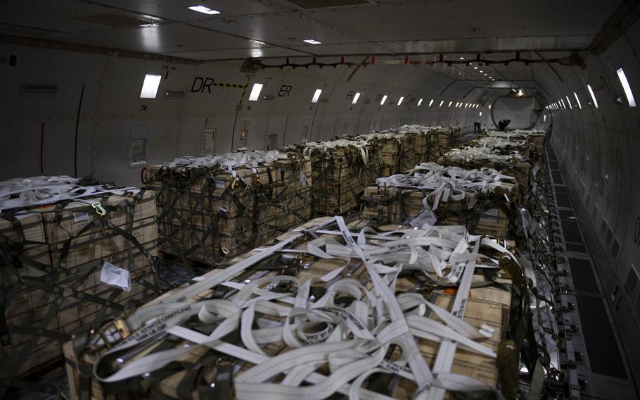 Pallets of ammunition, weapons and other equipment bound for Ukraine are secured onto a plane during a foreign military sales mission at Dover Air Force Base, Del., on Feb. 28, 2022. Since 2014, the United States has committed more than $5.4 billion in total assistance to Ukraine, including security and nonsecurity assistance. 
