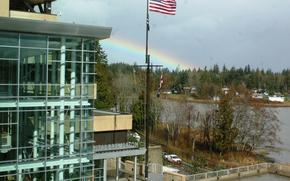 A rainbow is seen behind Naval Hospital Bremerton at Bremerton, Wash. An analysis by the Congressional Budget Office found that the Navy would have to spend more than $49 billion on upgrades to 20,000 buildings at its U.S. bases to get the facilities up to standard and improve them.