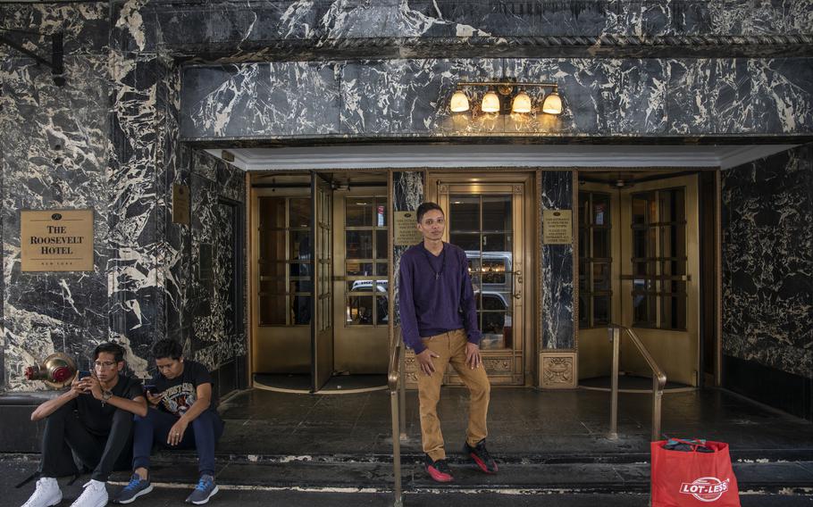 Antony Reyes, 23, a recent arrival from Venezuela, on June 1, 2023, outside the Roosevelt Hotel in Manhattan. The hotel, which shuttered during the pandemic, now functions as a shelter and reception center for migrants.