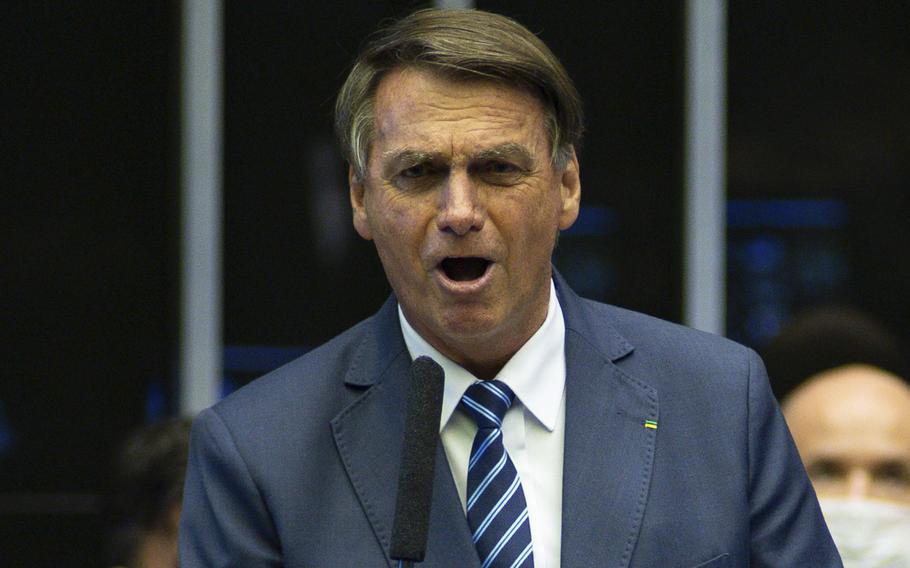 Brazil’s President Jair Bolsonaro speaks during a briefing in Brasilia, Brazil, on Feb. 2, 2022. 