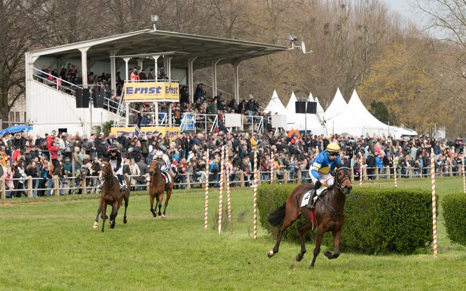 Jockeys compete at the historic grass racetrack in Zweibruecken, Germany, April 16, 2023.